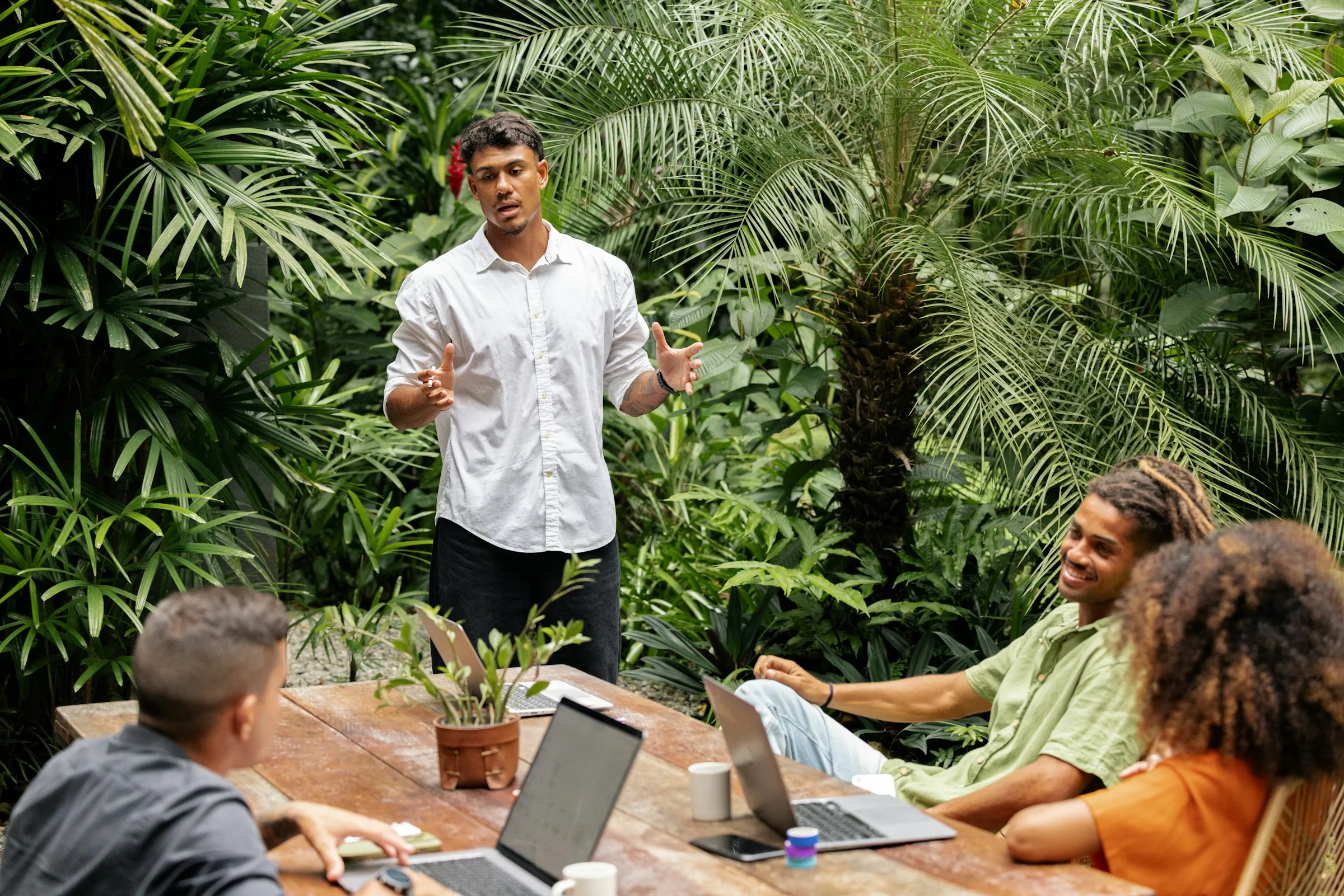 Outdoor meeting in lush garden setting