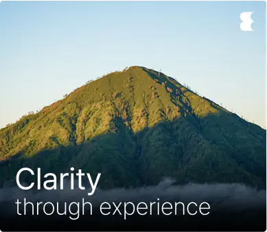Mountain under clear sky with 'Clarity' text.